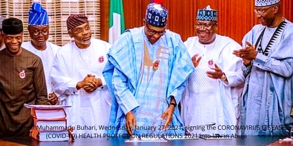President Muhammadu Buhari, Wednesday, January 27, 2021, signing the CORONAVIRUS DISEASE (COVID-19) HEALTH PROTECTION REGULATIONS 2021 into law in Abuja Photo