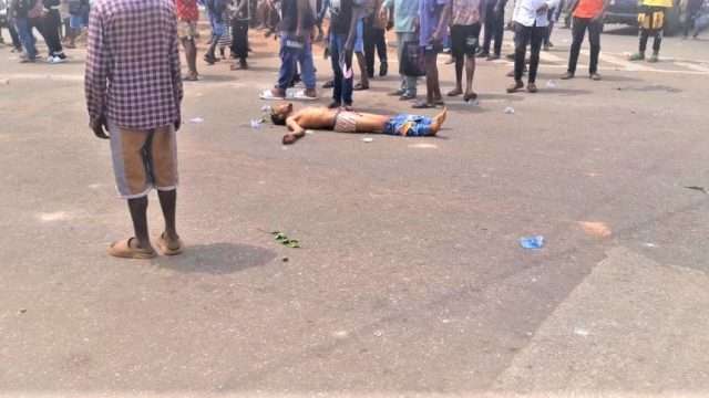 The corpse of one of the victims of the Benin riot
