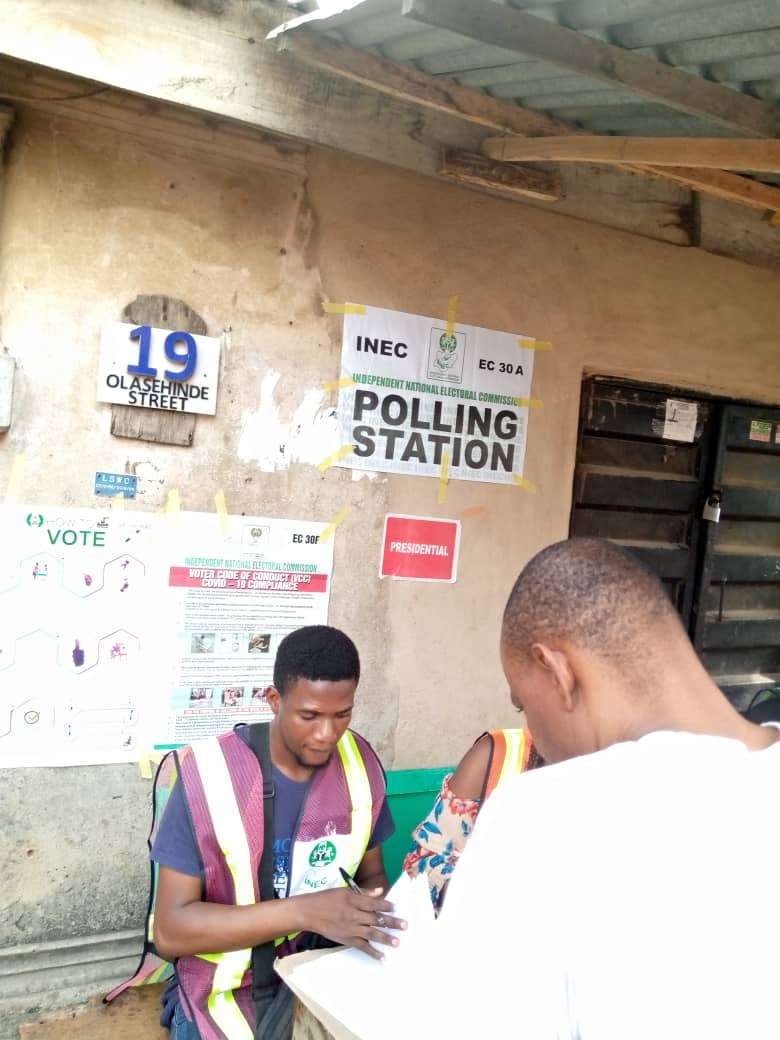 This is polling Station aEC 30A, people are on queue voting , No 19 ,Olashinde Street Mushin.
